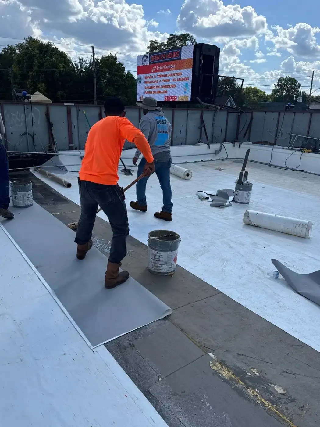 Tarping and dry-in on a Auburn commercial roof